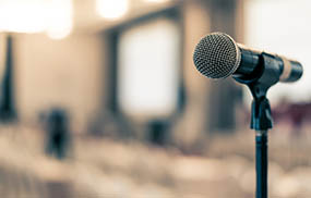 microphone voice speaker in business seminar, speech presentation, town hall meeting, lecture hall or conference room in corporate or community event for host or public hearing
